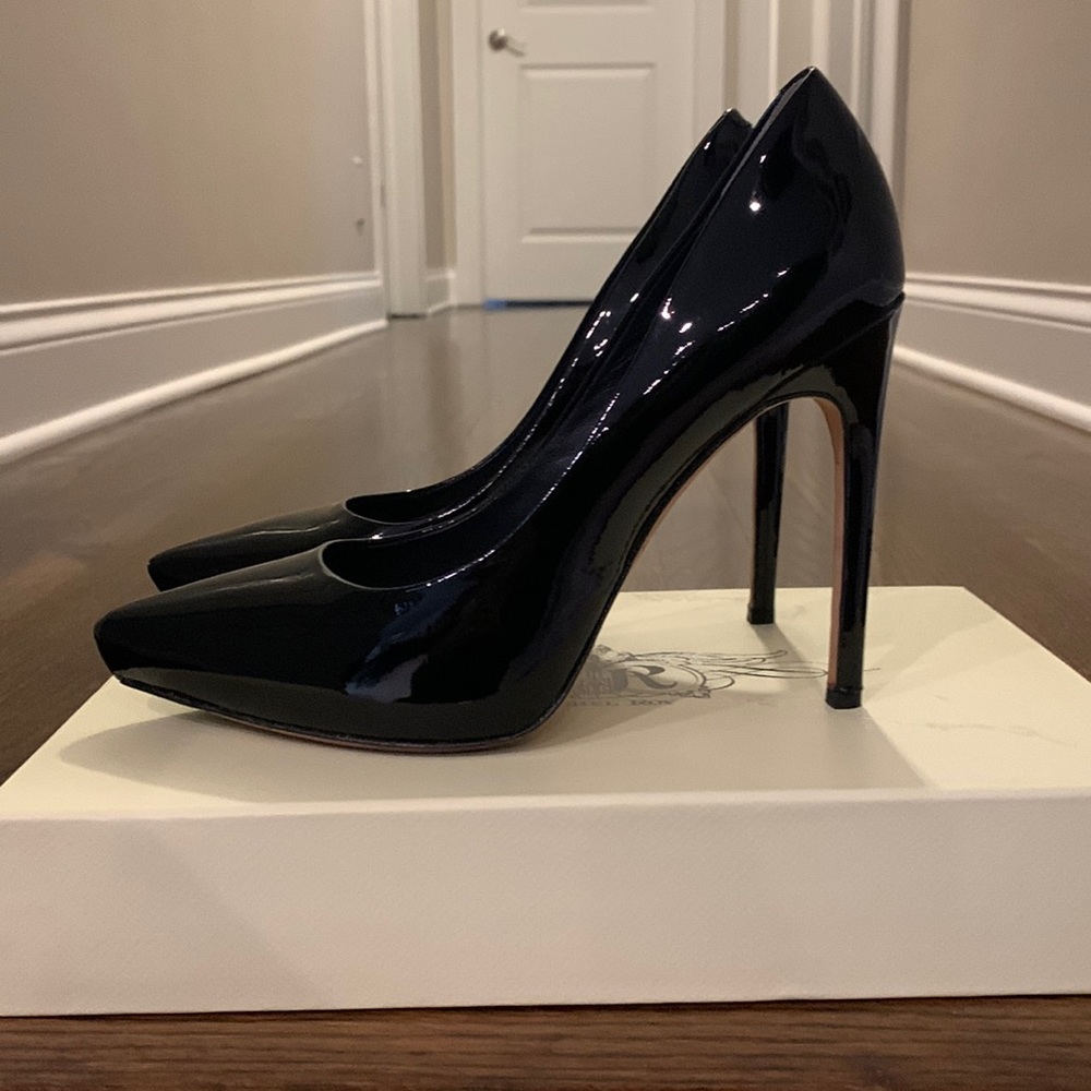 Rachel Roy used black patent leather stiletto pumps. Selling shoes to high